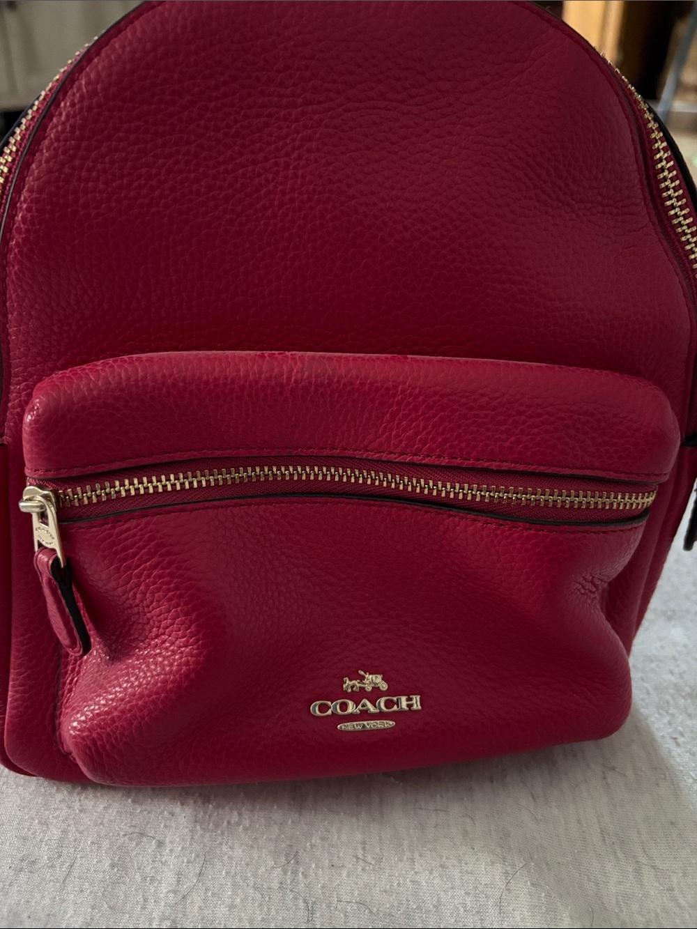 Coach Pebbled Leather Mini Backpack in Berry